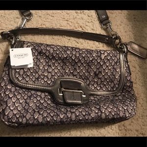 Brand new Coach Purse still has original tags